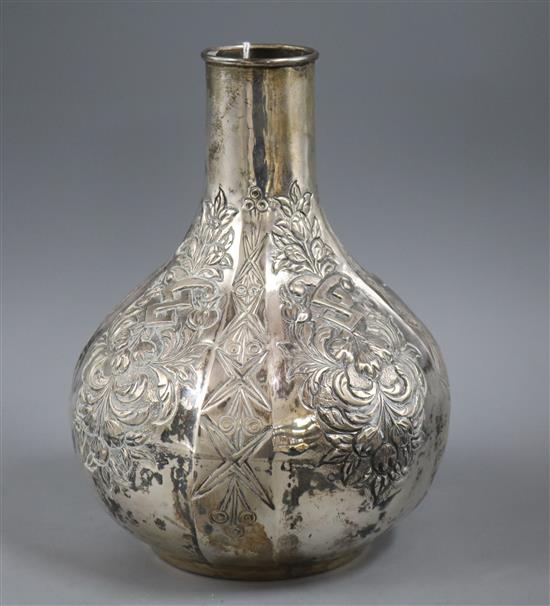 A continental embossed 925 white metal bottle vase, 20.3cm.